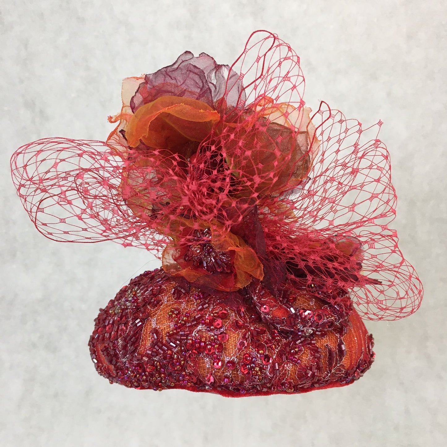 Anna: Vibrant Orange Dome Cocktail Fascinator Accented with Handmade Hues of Organza Florals