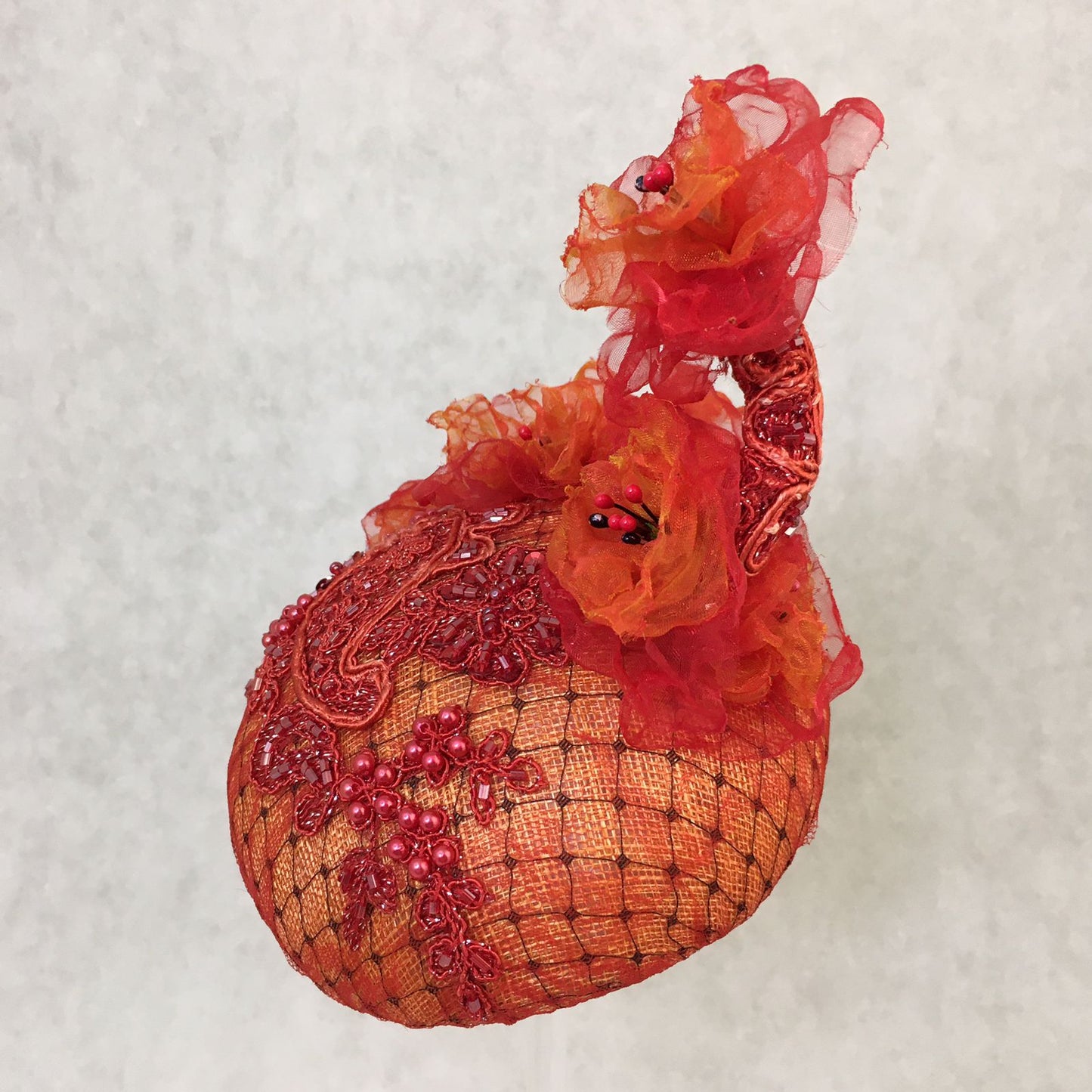 Aria: Orange Compact Dome Cocktail Fascinator Accented with Handmade Organza Florals on a Beaded Vine