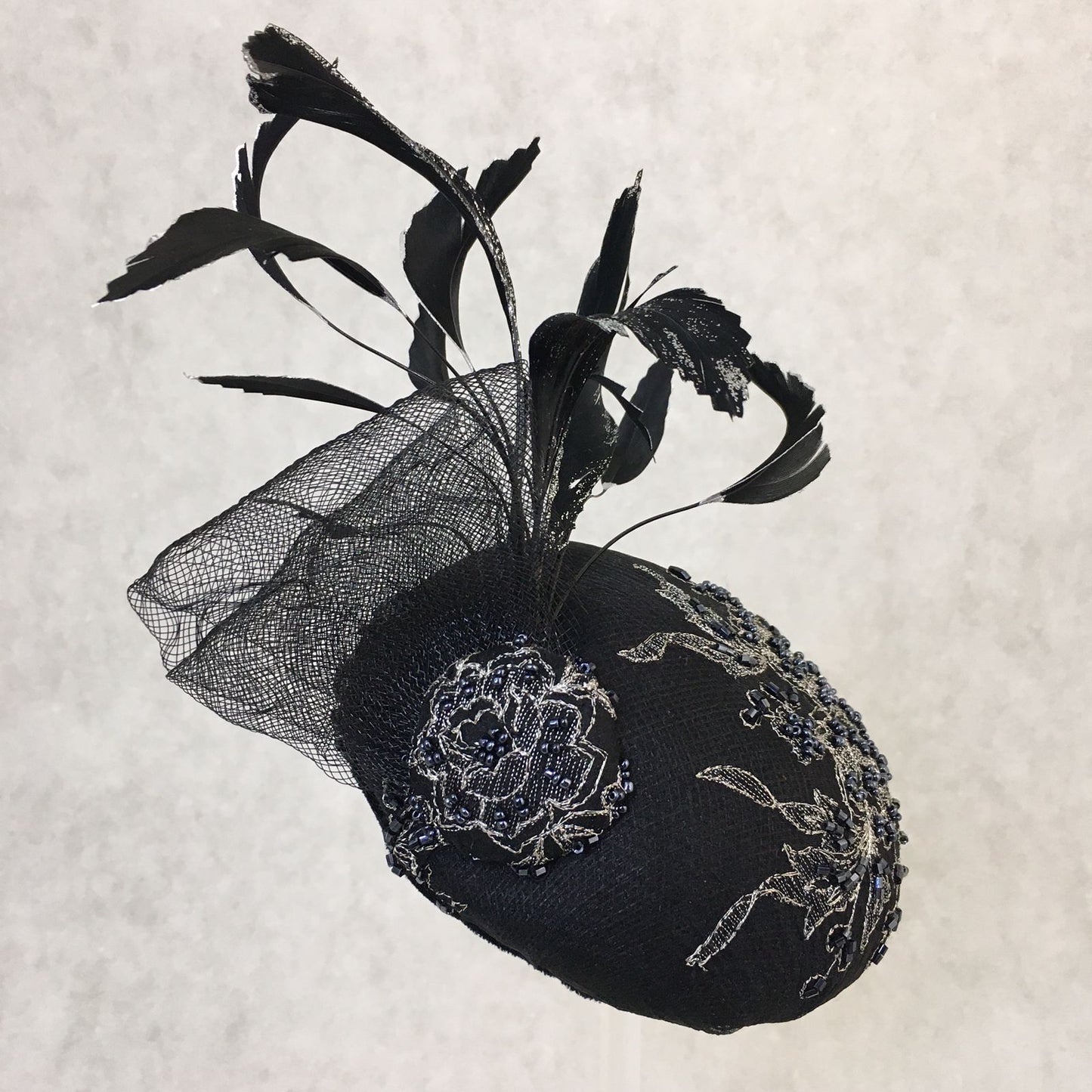 Bailey: Black and Silver Dome Cocktail Hat Accented with Hand Painted Black Feathers and Crinolin Bow