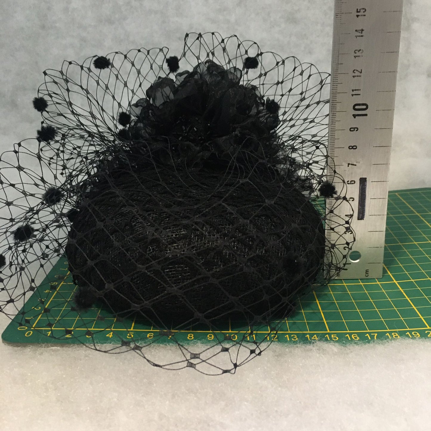 Beatrice: Black Dome Cocktail Fascinator with Black Spotted Veiling Trimmed with Hand Made Flowers