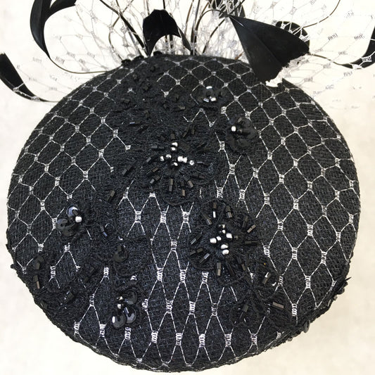 Bethany: Black and Silver Slanted Cocktail Fascinator Accented with Hand Crafted Black Feathers and Silver Veiling