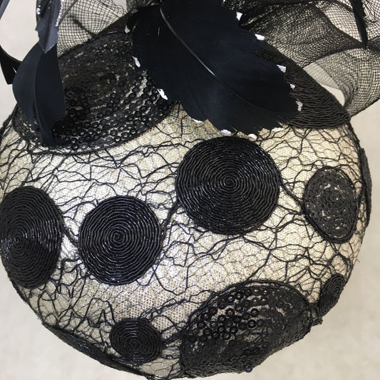 Brianna: Black and Silver Dome Cocktail Fascinator Accented with a Hand Pained Feathers and Distressed Crinoline Bow