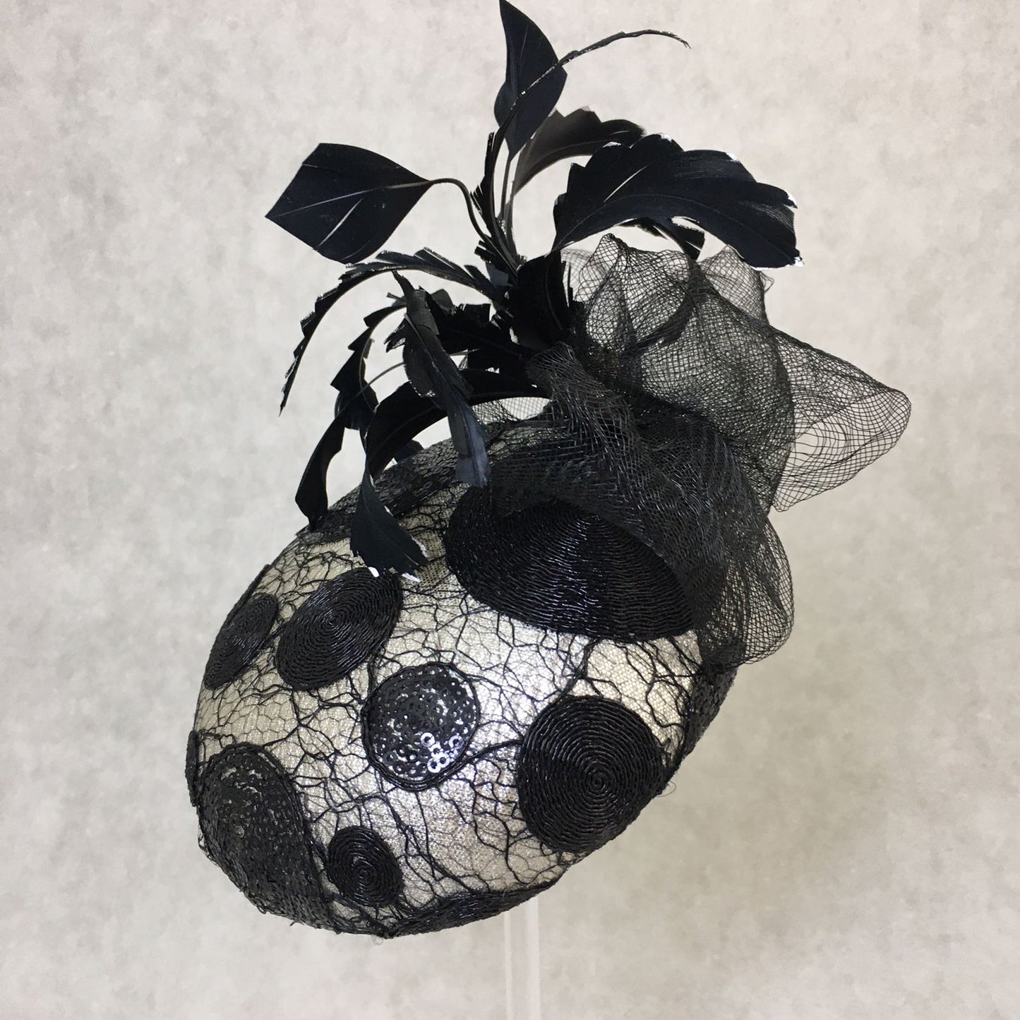 Brianna: Black and Silver Dome Cocktail Fascinator Accented with a Hand Pained Feathers and Distressed Crinoline Bow
