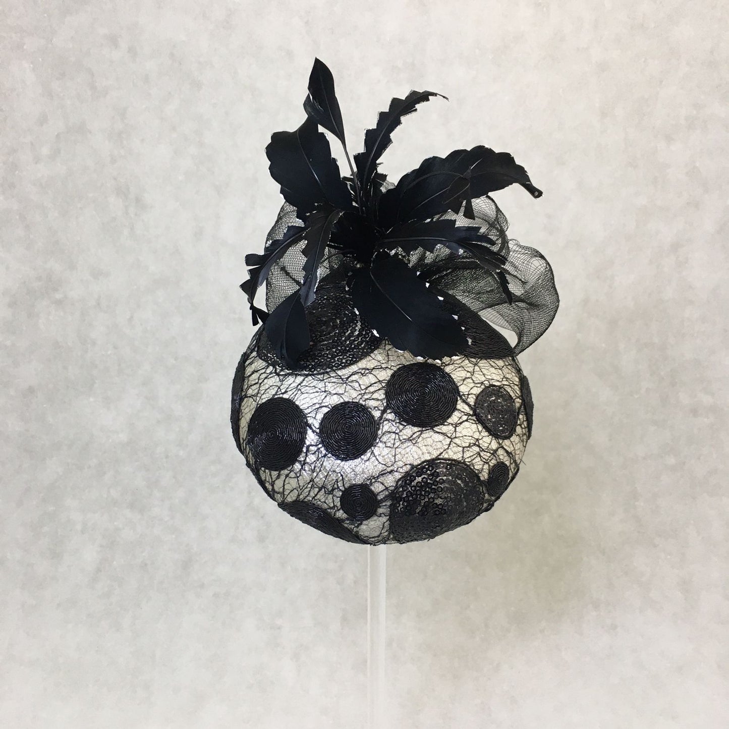 Brianna: Black and Silver Dome Cocktail Fascinator Accented with a Hand Pained Feathers and Distressed Crinoline Bow