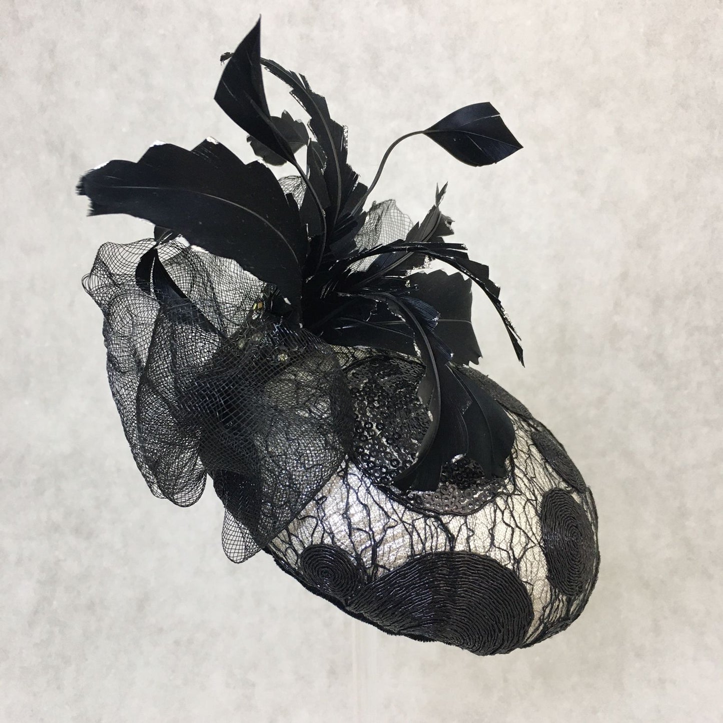Brianna: Black and Silver Dome Cocktail Fascinator Accented with a Hand Pained Feathers and Distressed Crinoline Bow