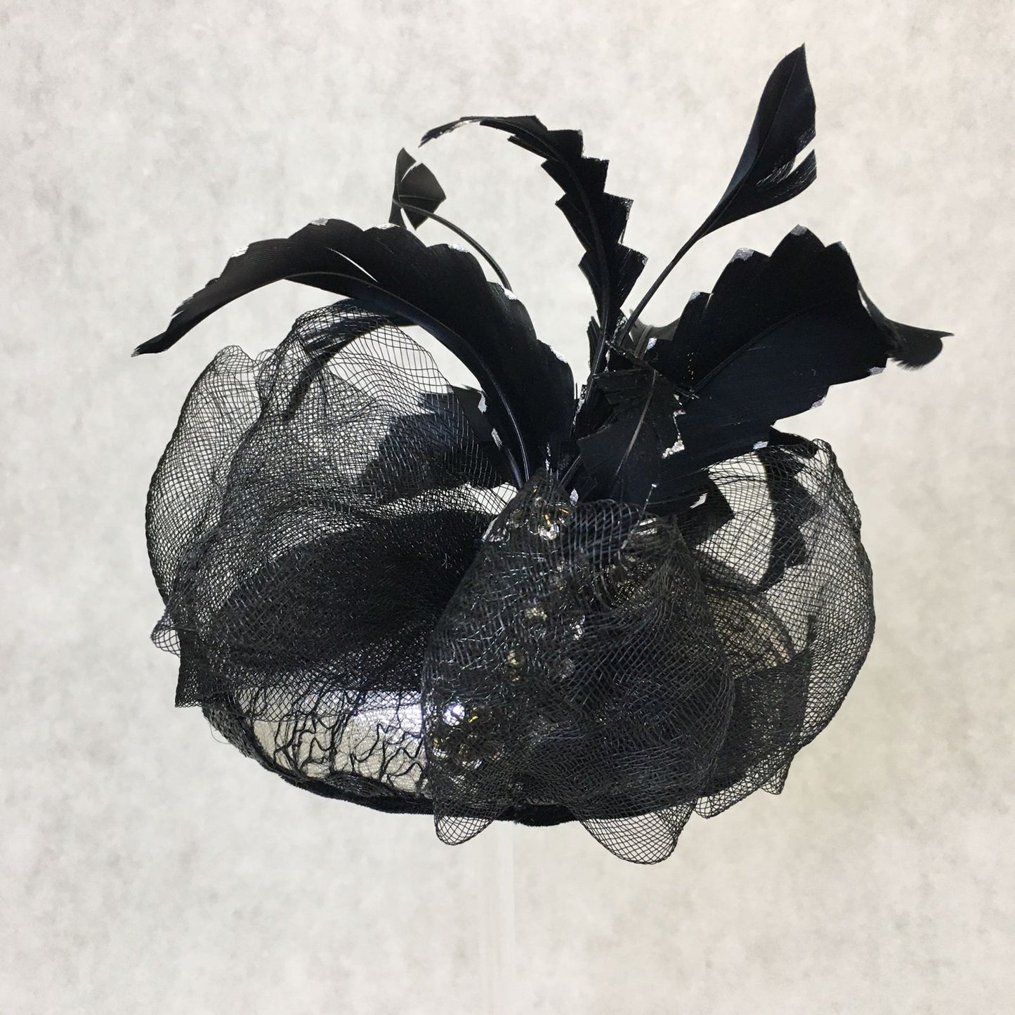Brianna: Black and Silver Dome Cocktail Fascinator Accented with a Hand Pained Feathers and Distressed Crinoline Bow