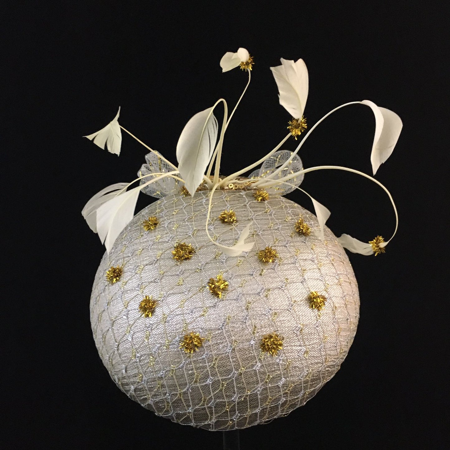 Winnie: Iced Silver Dome Cocktail Fascinator Accented by Gold Dots and Cream Feather Spray