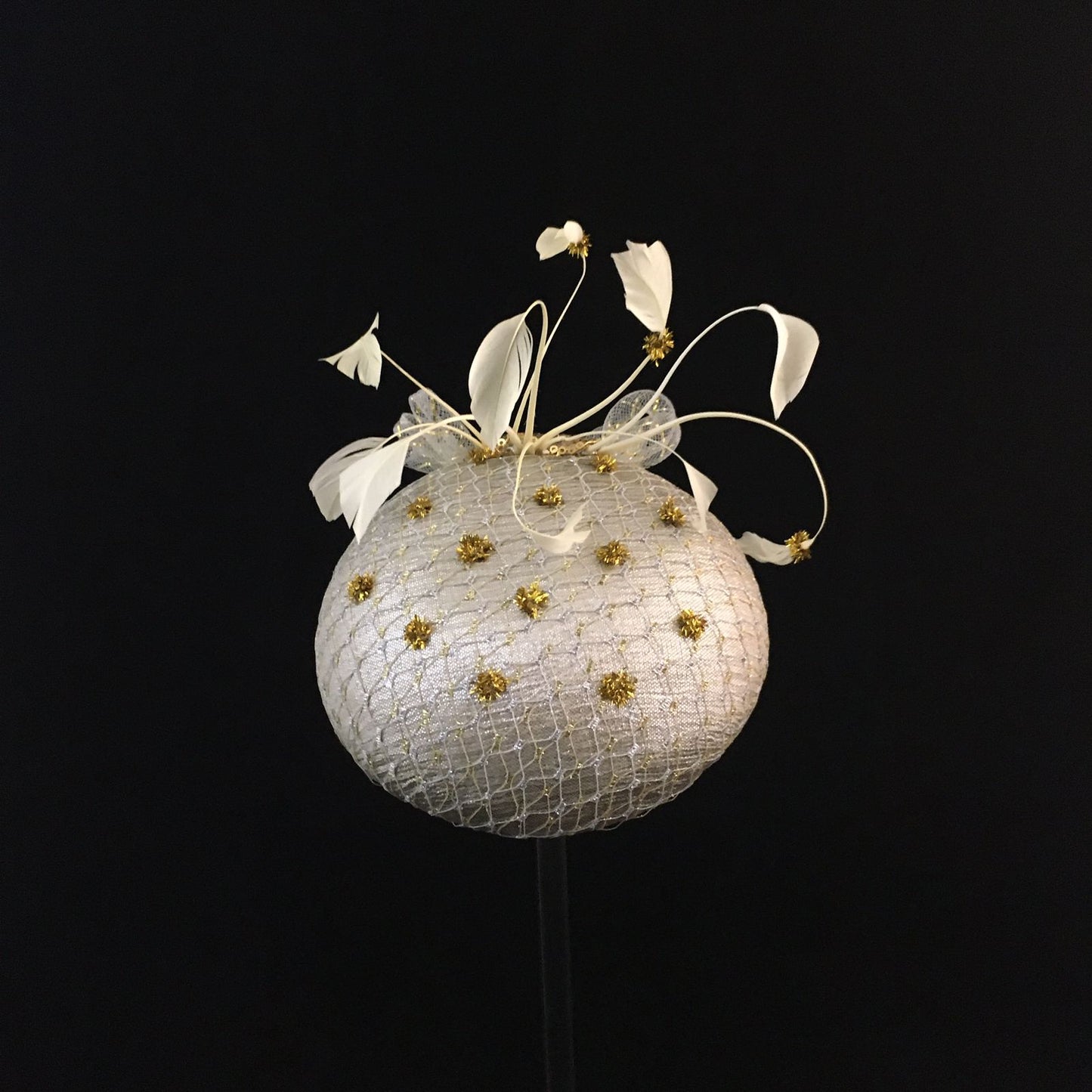 Winnie: Iced Silver Dome Cocktail Fascinator Accented by Gold Dots and Cream Feather Spray