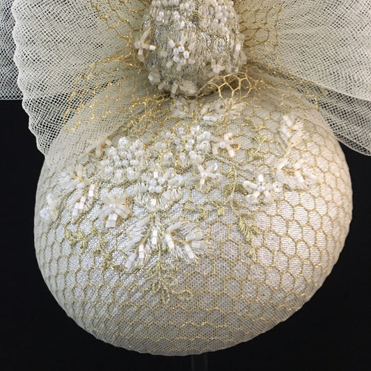 Winona: Cream and Gold Cocktail Dome Fascinator Accented with a Crinoline Bow and Hand Beaded Overlay Fabric