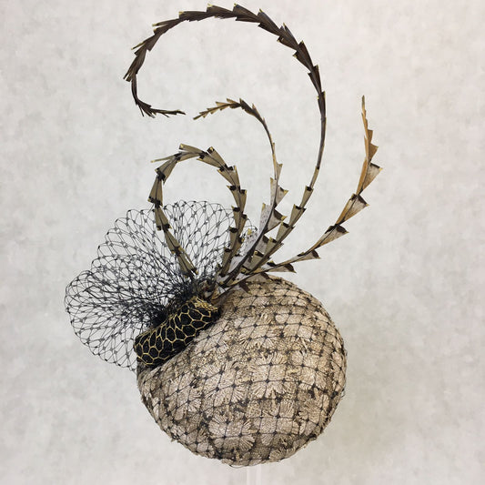 Bambi: Petite Dome Cocktail FascinatorAccented with Pheasant feathers and Black netted Veiling