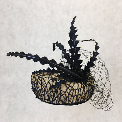 Barbara: Slanted Cocktail Fascinator with Gold Base and Spider Netting, Accented with Feather Spray