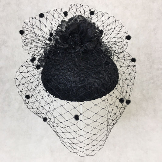 Beatrice: Black Dome Cocktail Fascinator with Black Spotted Veiling Trimmed with Hand Made Flowers