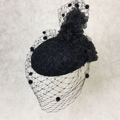 Beatrice: Black Dome Cocktail Fascinator with Black Spotted Veiling Trimmed with Hand Made Flowers