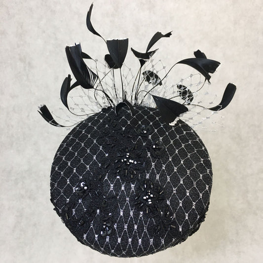 Bethany: Black and Silver Slanted Cocktail Fascinator Accented with Hand Crafted Black Feathers and Silver Veiling