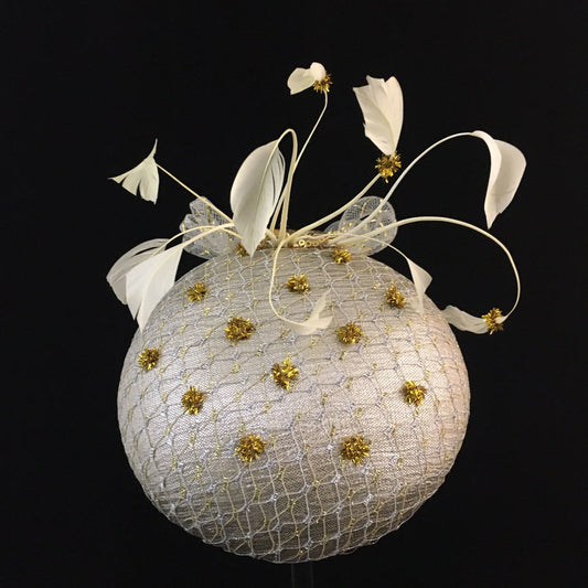 Winnie: Iced Silver Dome Cocktail Fascinator Accented by Gold Dots and Cream Feather Spray